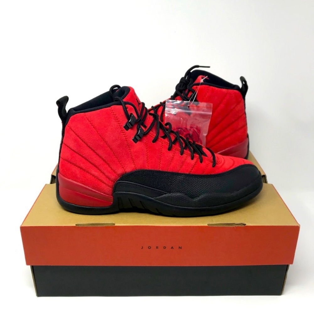 Jordan 12 one shoe is size 10.5 one is size 11